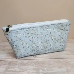 small fabric pouch with white zipper
